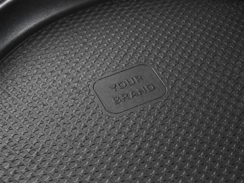 Embossing concept with YOUR BRAND relief inside the textured pan bottom.