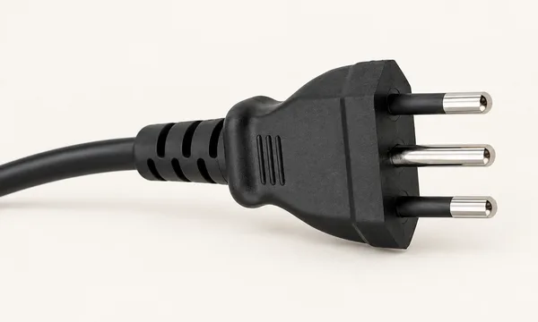 Black Italian plug with three round pins in a straight line.