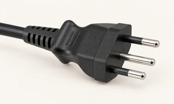Black Brazilian plug with three round pins in a shallow triangle.