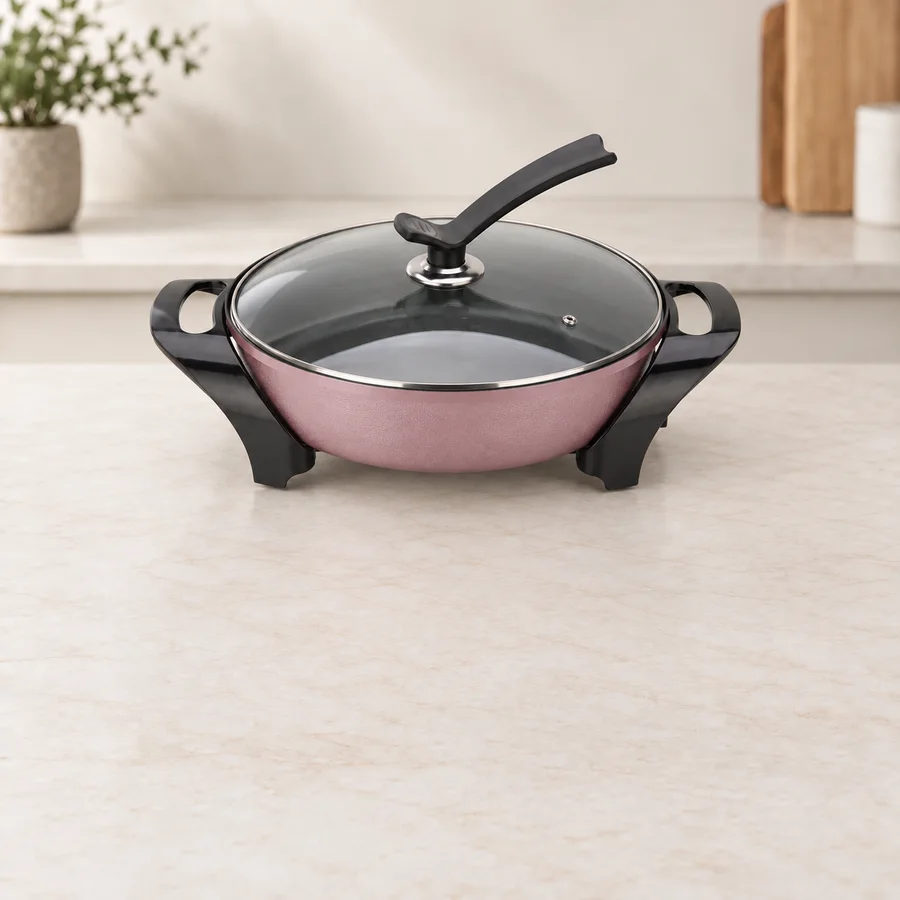 Electric skillet with glass lid.